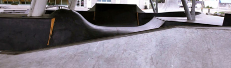 Dark, smooth bowls of Chuck Bailey skatepark